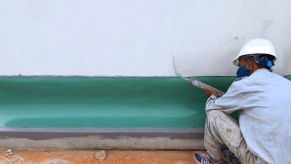 Chống thấm khe tiếp giáp giữa 2 nhà bằng máng tôn